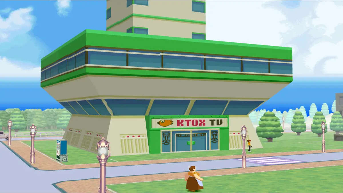the k-tox tv building with a woman outside of it
